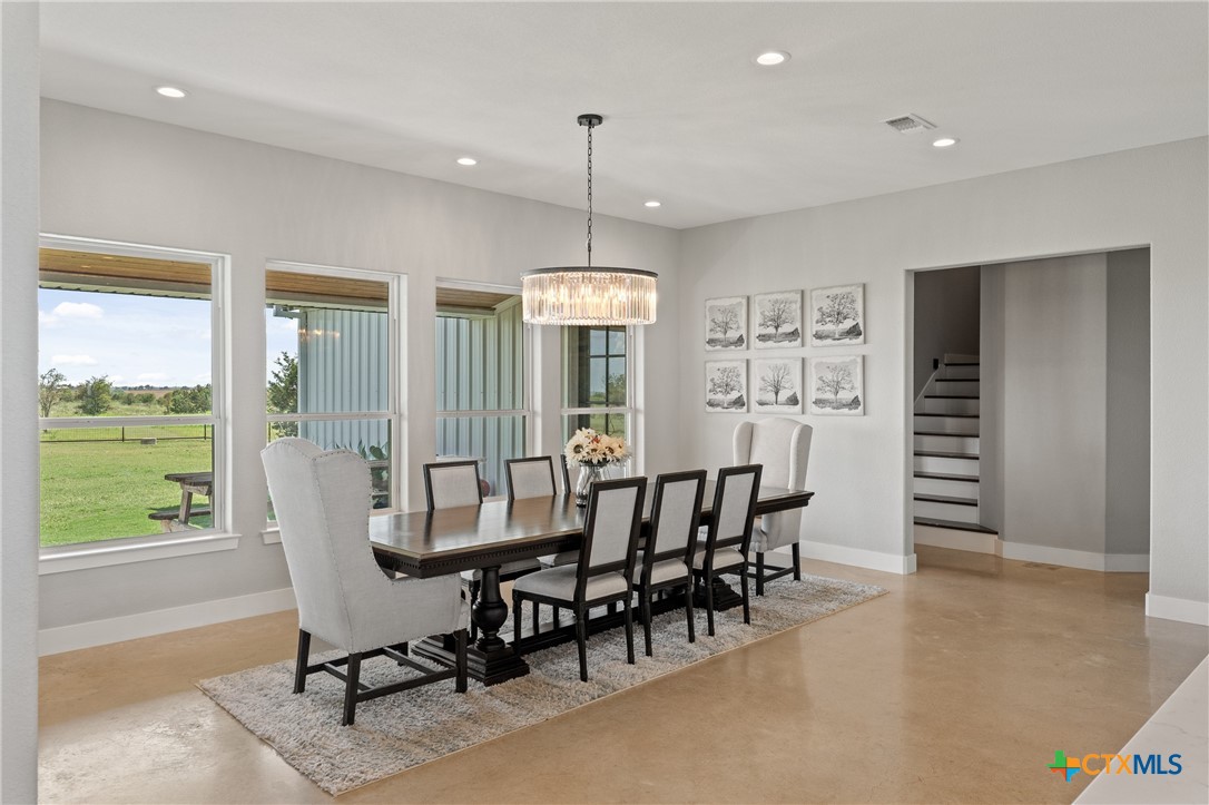 7351 Hackberry Road Holland, TX 76534 - Photo 10 of 41 a view of a dining room with furniture window and outside view