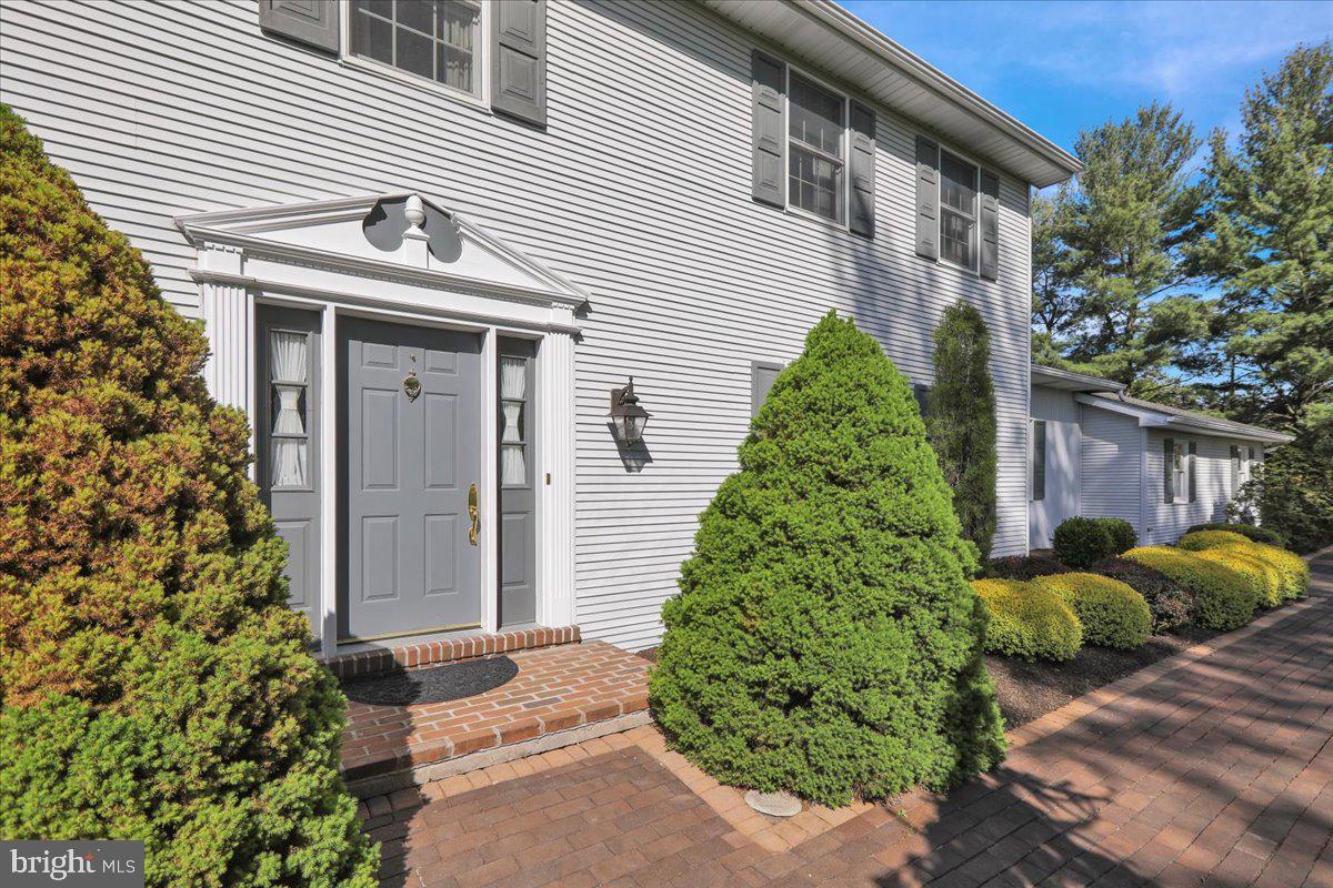 22 Lisa Road Sinking Spring, PA 19608 - Photo 12 of 60 a backyard of a house with plants and outdoor space