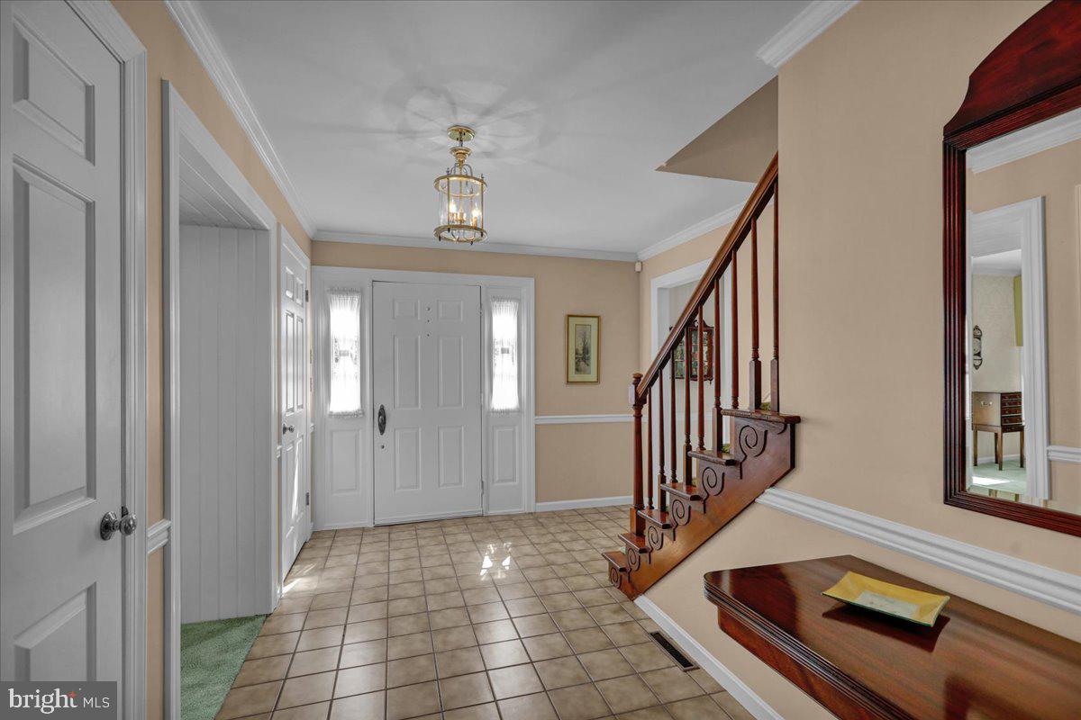 22 Lisa Road Sinking Spring, PA 19608 - Photo 13 of 60 a view of a hallway with windows and stairs