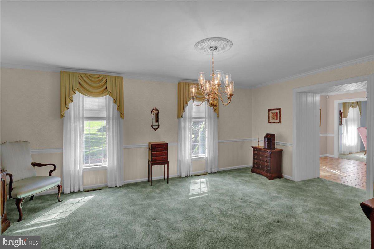 22 Lisa Road Sinking Spring, PA 19608 - Photo 18 of 60 a view of a livingroom with a chandelier furniture and windows