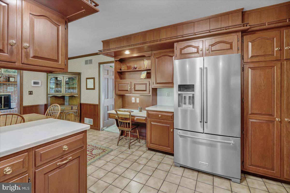 22 Lisa Road Sinking Spring, PA 19608 - Photo 23 of 60 a kitchen with stainless steel appliances a refrigerator and a stove top oven