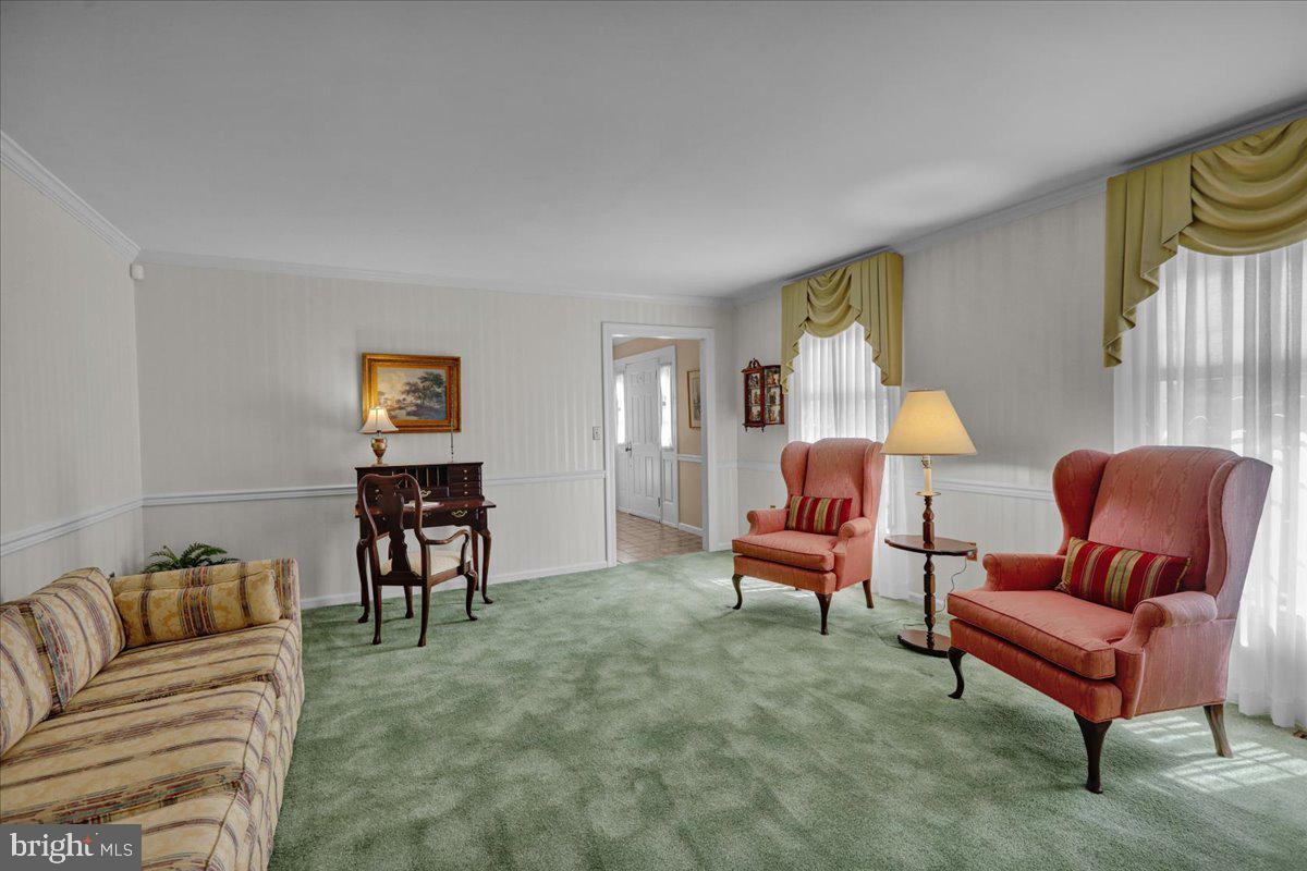 22 Lisa Road Sinking Spring, PA 19608 - Photo 27 of 60 a living room with furniture and a lamp