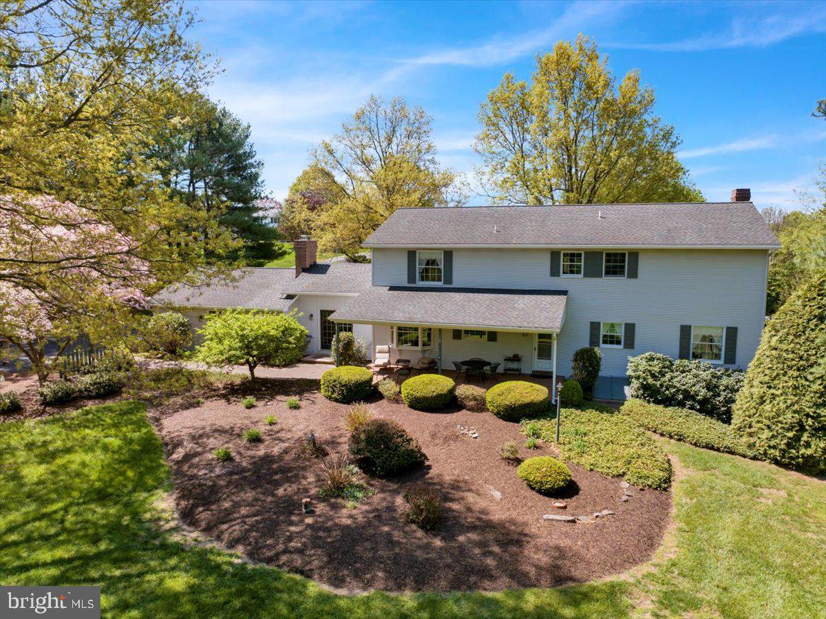 22 Lisa Road Sinking Spring, PA 19608 - Photo 3 of 60 a view of a house with backyard outdoor seating area and covered with green space