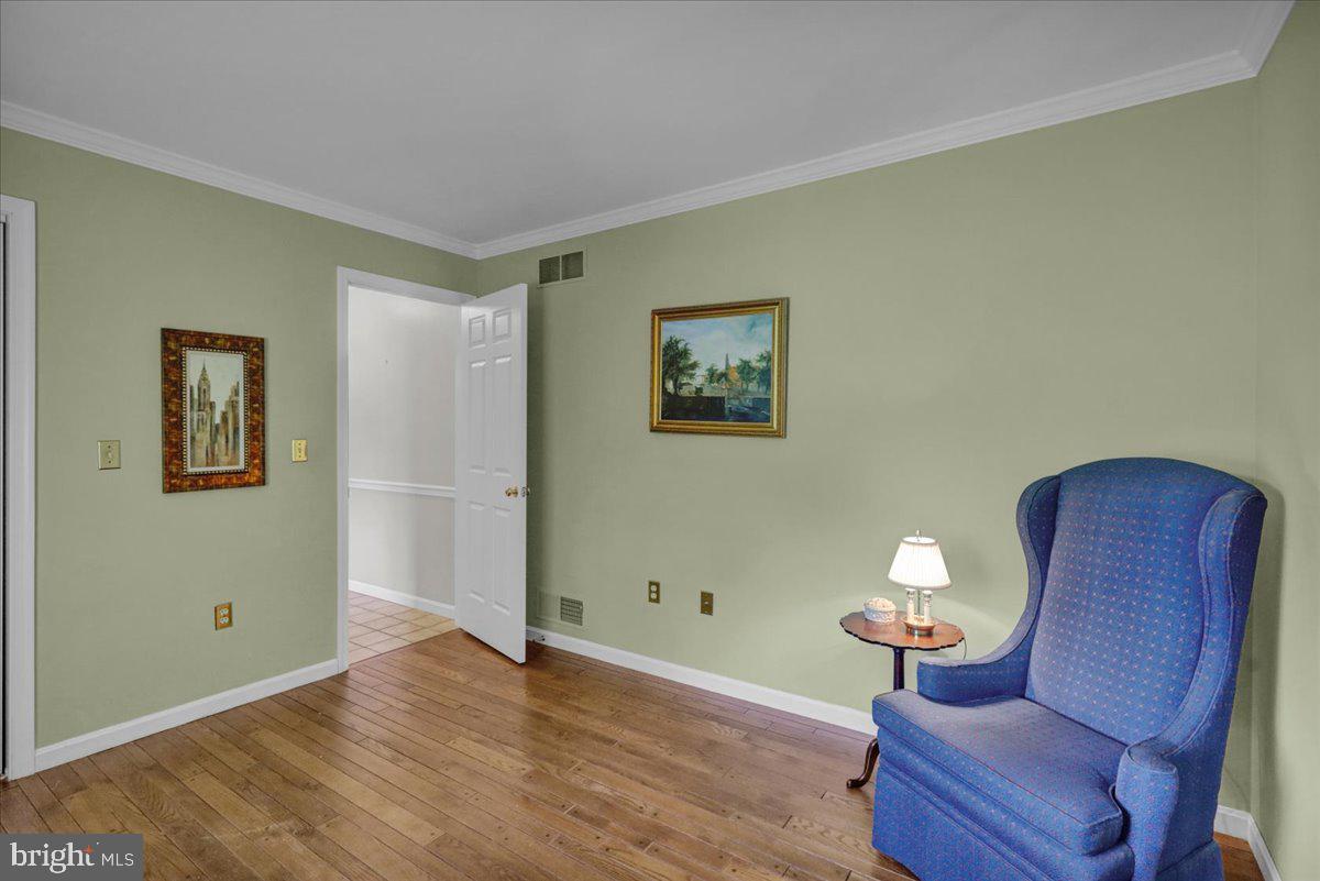 22 Lisa Road Sinking Spring, PA 19608 - Photo 32 of 60 a view of livingroom with furniture and wooden floor