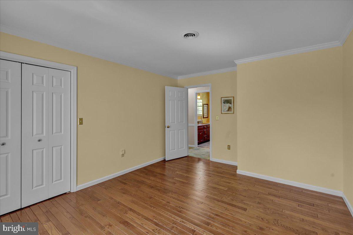 22 Lisa Road Sinking Spring, PA 19608 - Photo 46 of 60 a view of an empty room with wooden floor