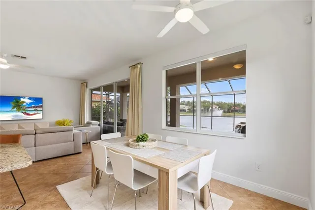 a view of a dining room kitchen and furniture