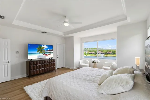 a room with furniture and a large window