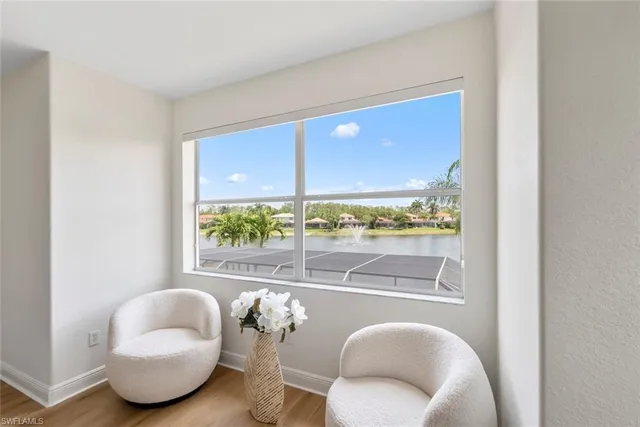 a bedroom with a large bed and a couch