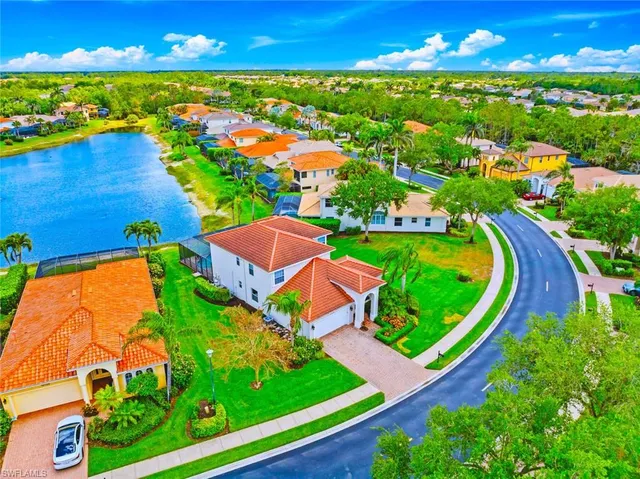 swimming pool view with a garden
