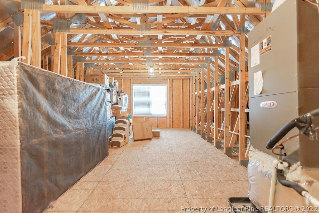 335 Turriff Way Cameron, NC 28326 - Photo 46 of 50 a view of entryway and hall with wooden floor