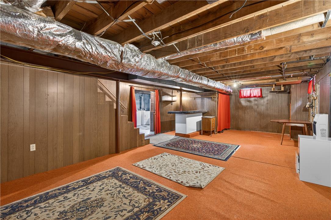 23 Harrison Street Emmaus, PA 18049 - Photo 22 of 28 Unfinished basement space, ready for your creative vision, offers exceptional potential.