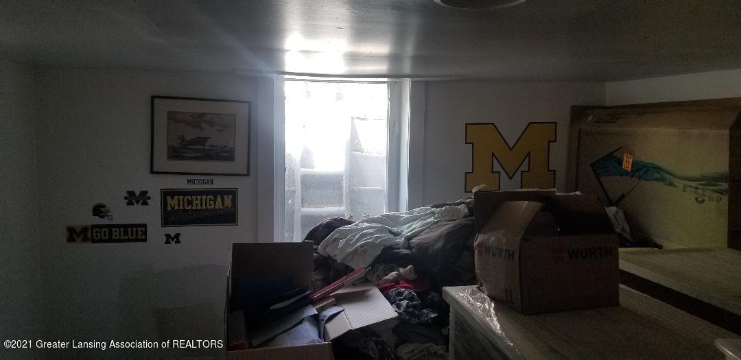 2137 North Aurelius Road Holt, MI 48842 - Photo 12 of 16 Lower level bedroom #4 w egress