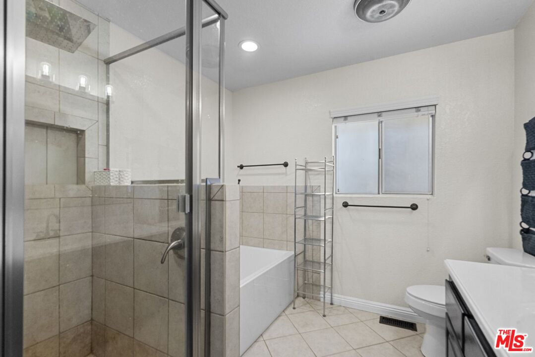 1197 Oriole Road Wrightwood, CA 92397 - Photo 15 of 50 a bathroom with a shower and a toilet