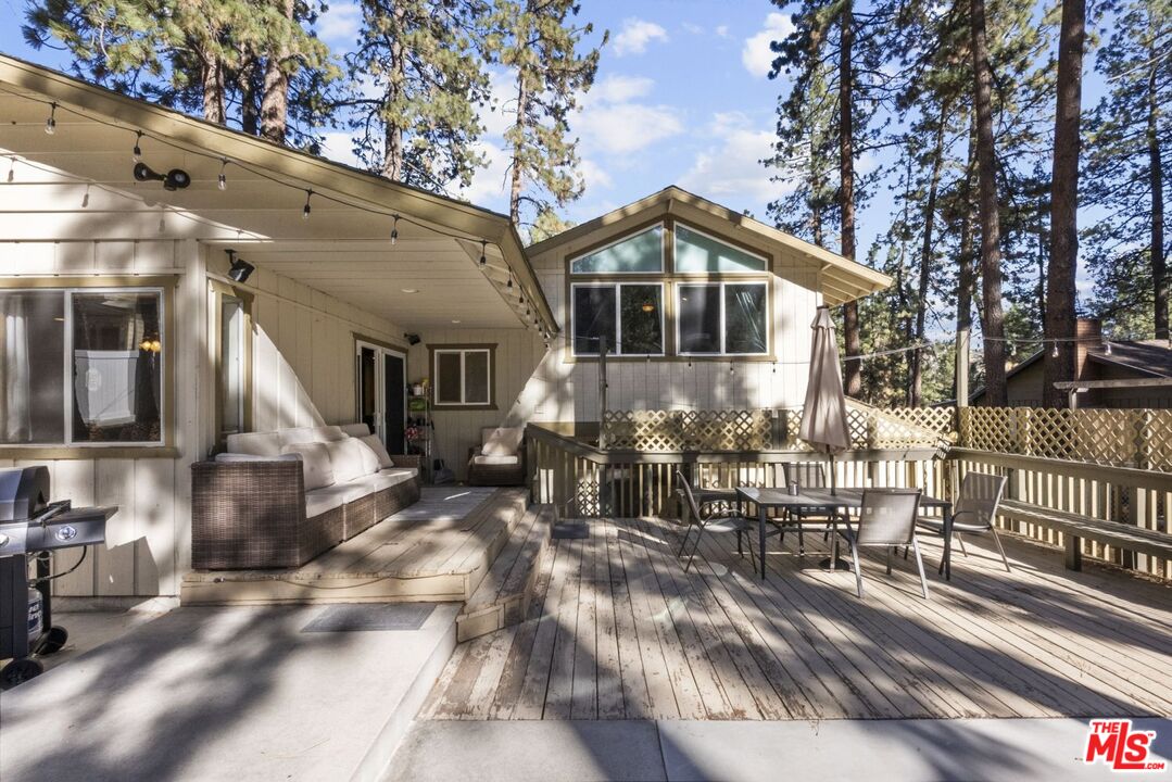 1197 Oriole Road Wrightwood, CA 92397 - Photo 20 of 50 a front view of a house with a yard