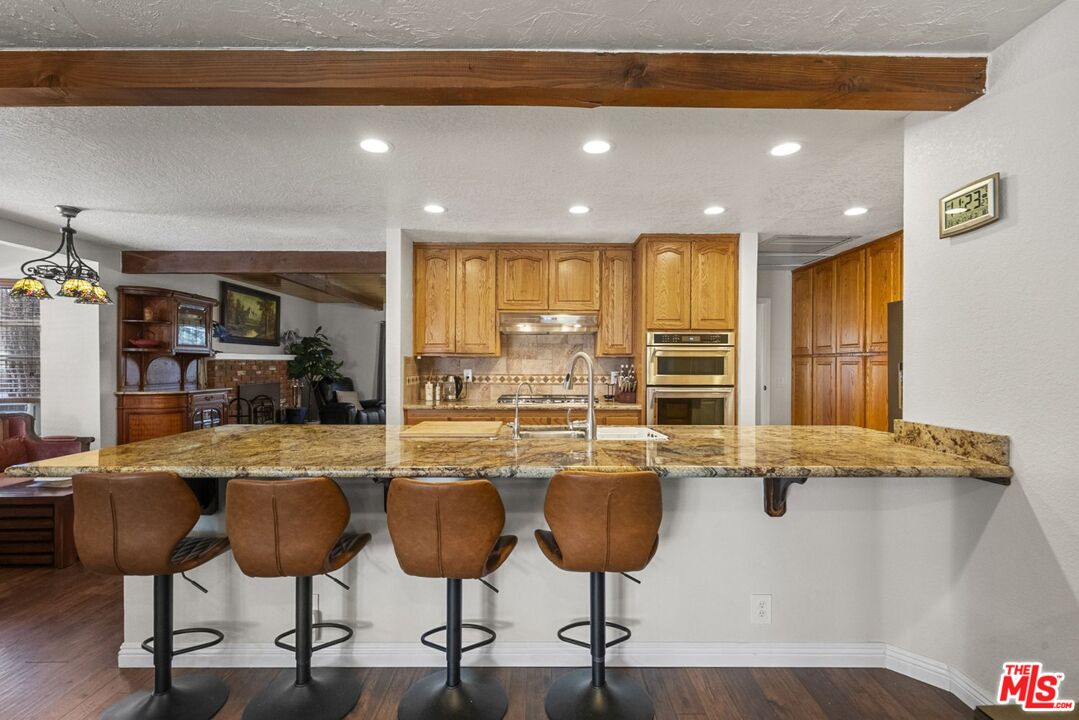 1197 Oriole Road Wrightwood, CA 92397 - Photo 7 of 50 a room with lots of chairs and mirrors