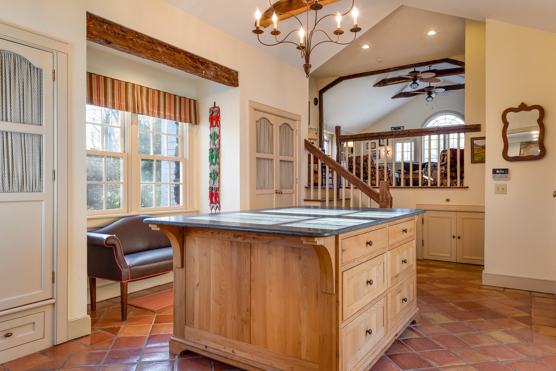 1403 Ponus Ridge Road New Canaan, CT 06840 - Photo 18 of 48 a kitchen with a stove a sink and a refrigerator