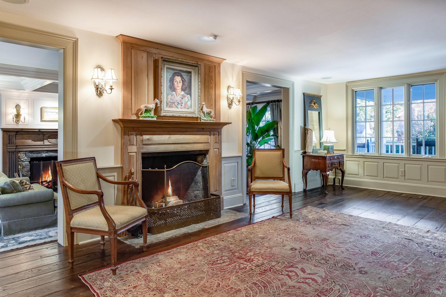 1403 Ponus Ridge Road New Canaan, CT 06840 - Photo 8 of 48 a living room with furniture and a fireplace