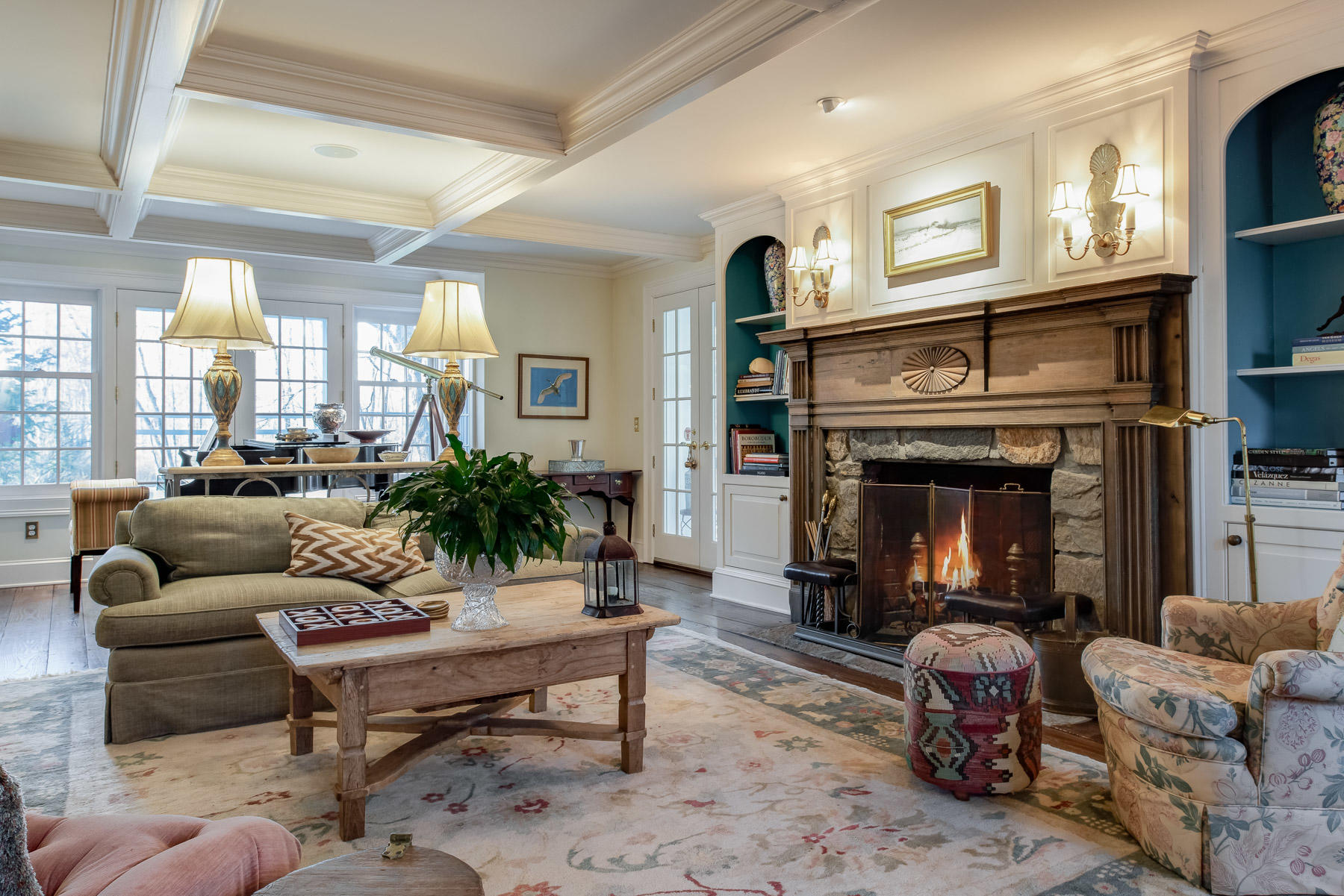 1403 Ponus Ridge Road New Canaan, CT 06840 - Photo 9 of 48 a living room with furniture a large window and a fireplace