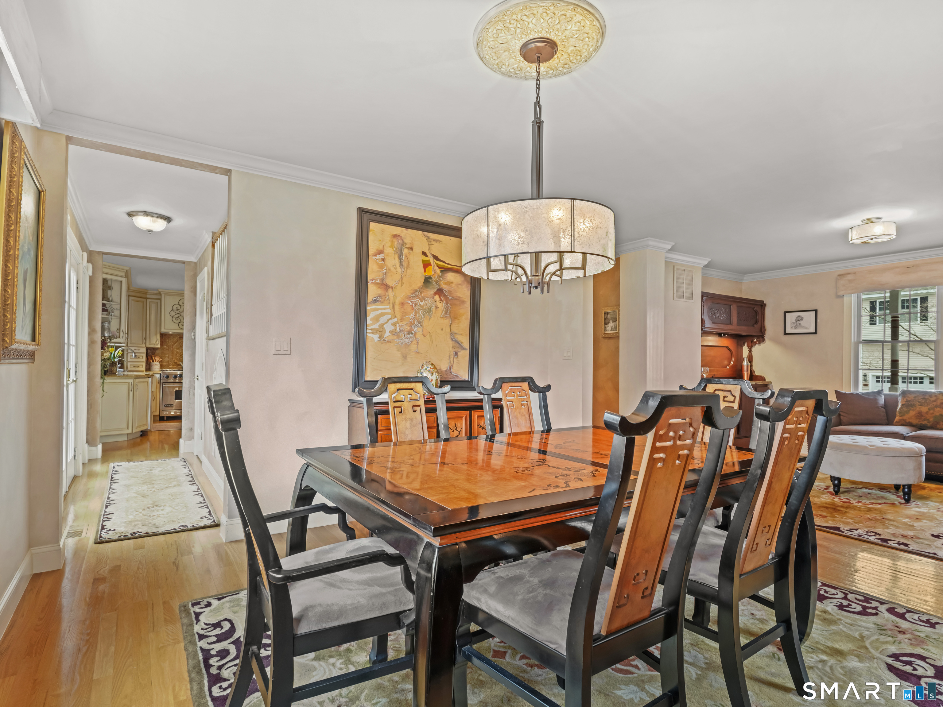 82 Ramapoo Road Ridgefield, CT 06877 - Photo 20 of 40 a view of a dining room with furniture window and wooden floor