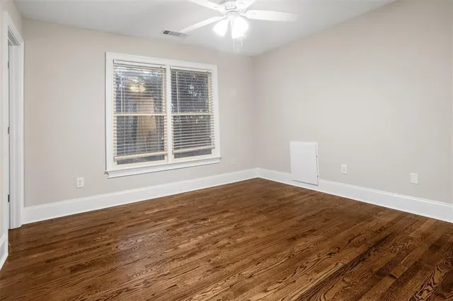 a view of staircase with wooden floor
