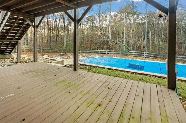 a view of livingroom with wooden floor and window