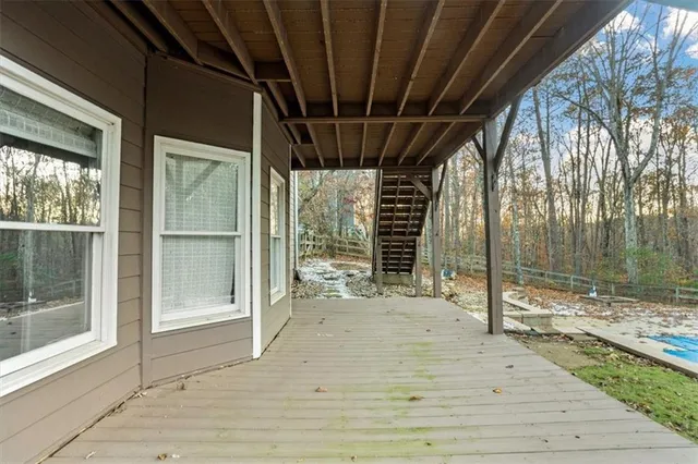 a view of a backyard with a tub