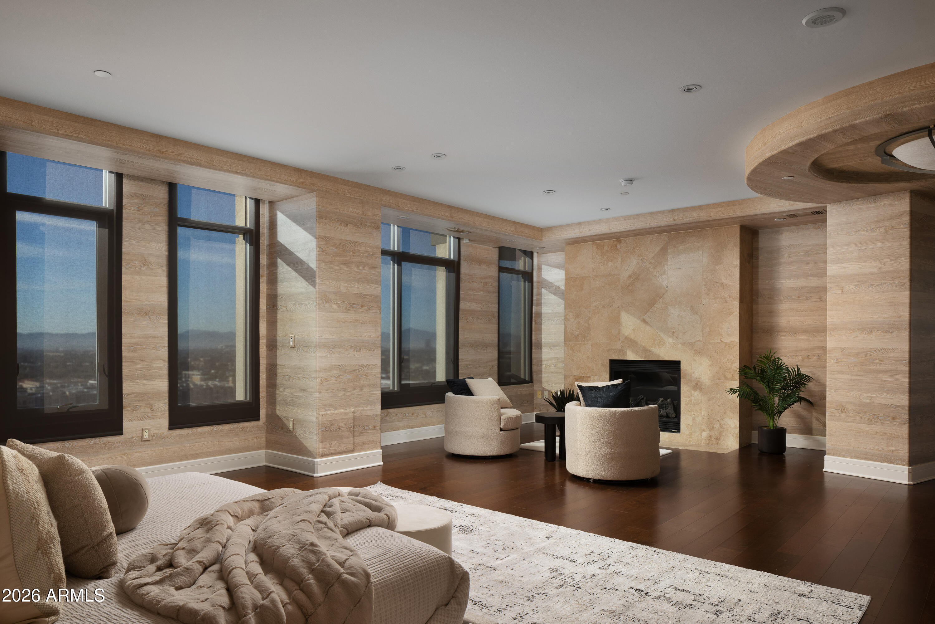 2402 East Esplanade Lane, Unit PH2 Phoenix, AZ 85016 - Photo 12 of 40 a living room with furniture and a potted plant