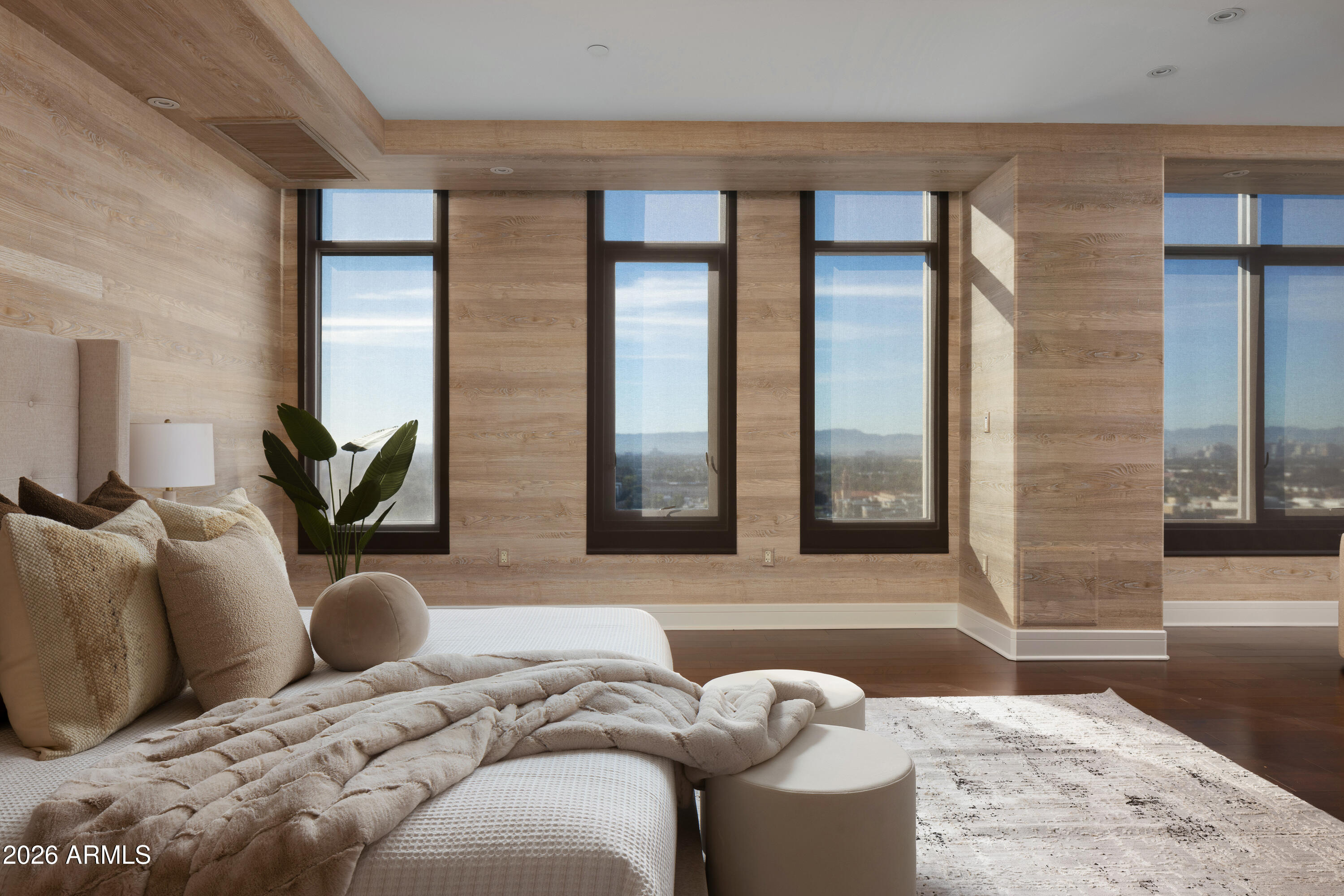 2402 East Esplanade Lane, Unit PH2 Phoenix, AZ 85016 - Photo 14 of 40 a bedroom with furniture and a large window