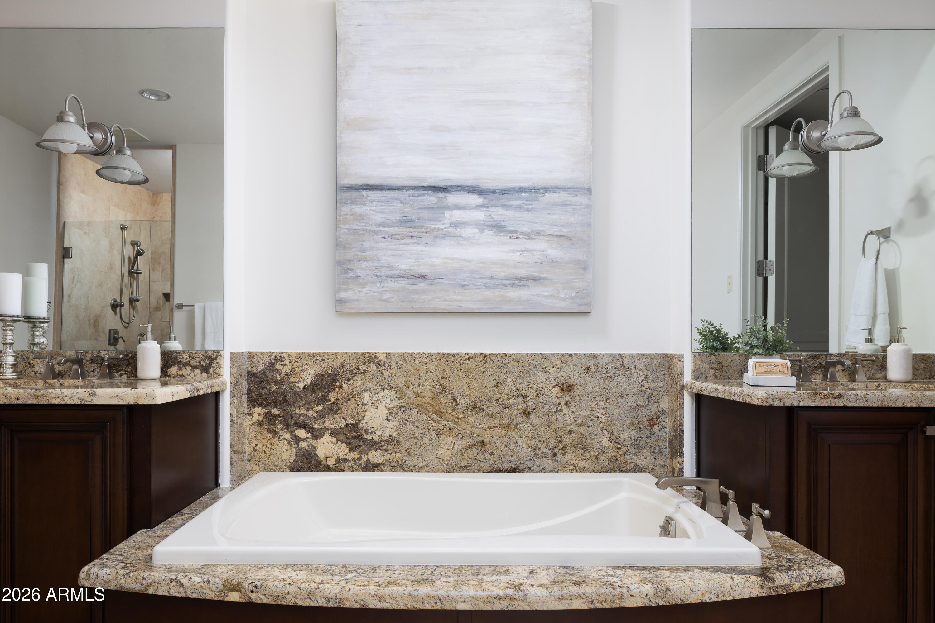 2402 East Esplanade Lane, Unit PH2 Phoenix, AZ 85016 - Photo 23 of 40 a bath tub sitting next to a bathroom sink