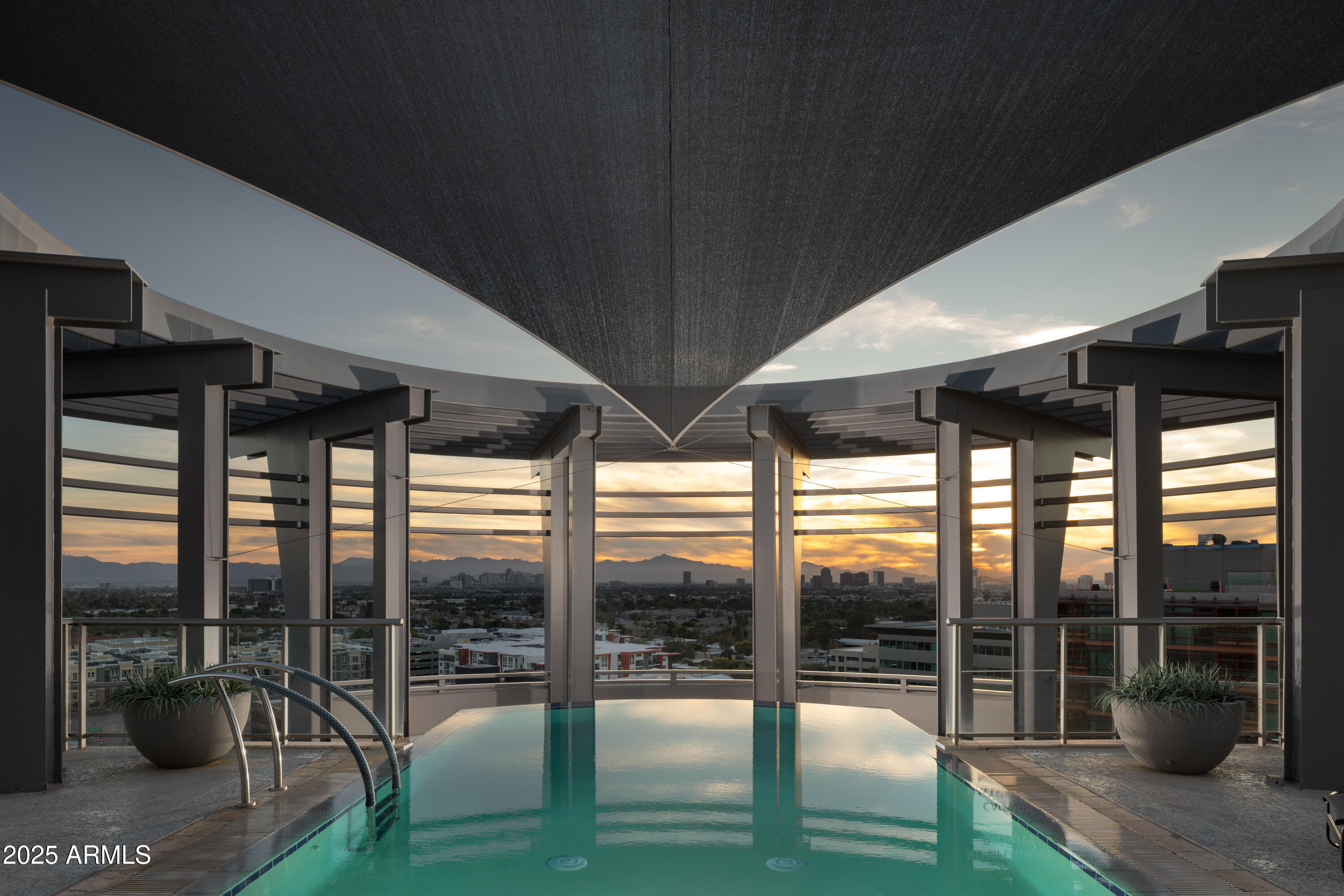 2402 East Esplanade Lane, Unit PH2 Phoenix, AZ 85016 - Photo 35 of 40 Twilight Rooftop Pool View