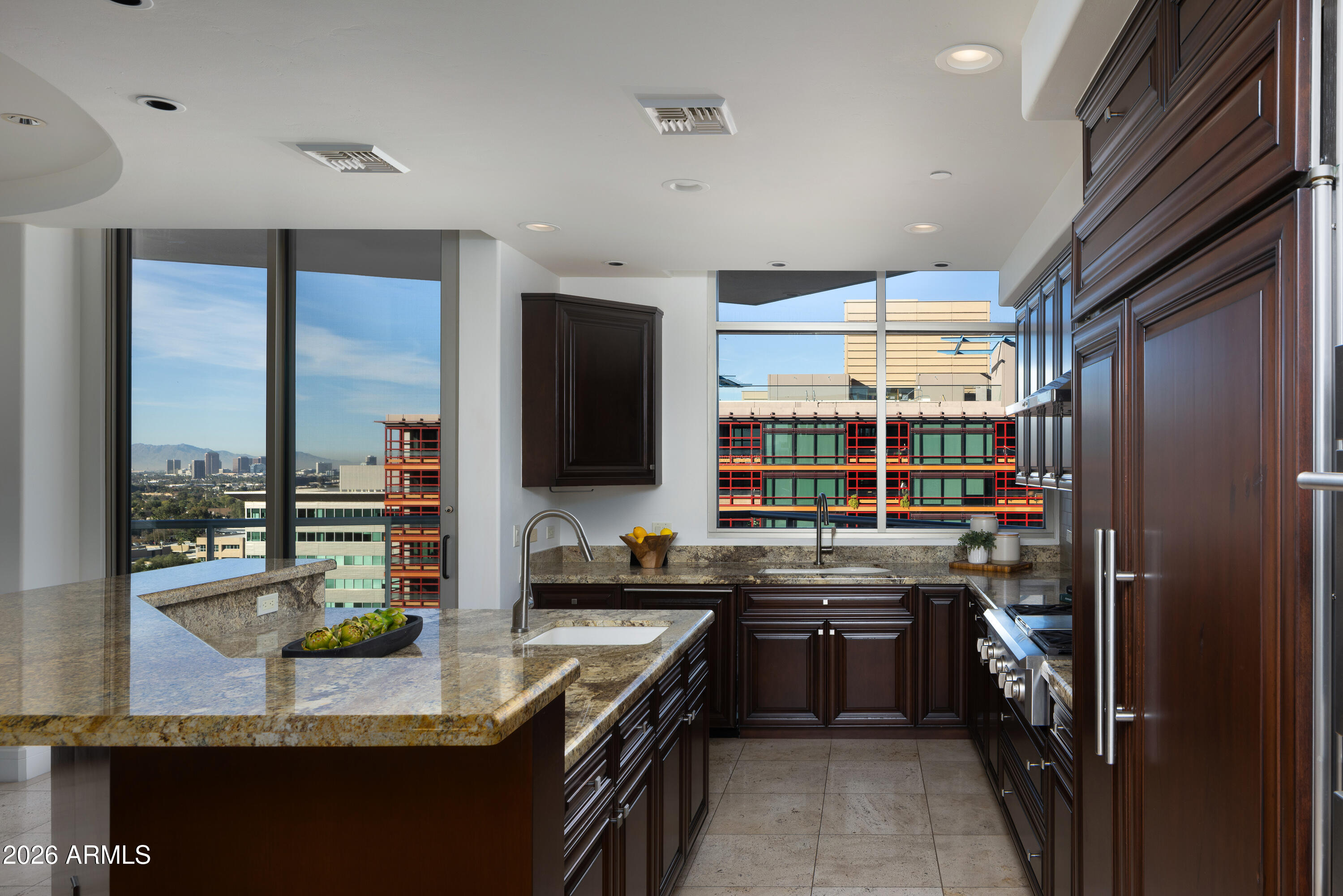 2402 East Esplanade Lane, Unit PH2 Phoenix, AZ 85016 - Photo 7 of 40 a kitchen with lots of counter top space