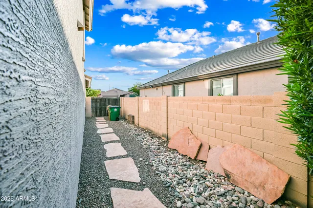 a view of a pathway with a yard