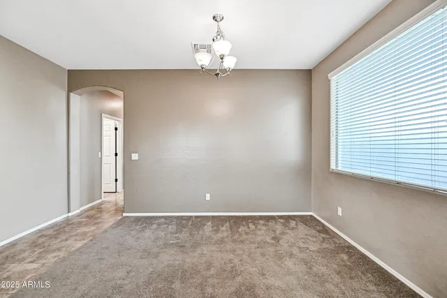 a view of an empty room with window