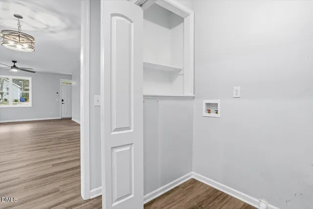 a view of small space with wooden floor