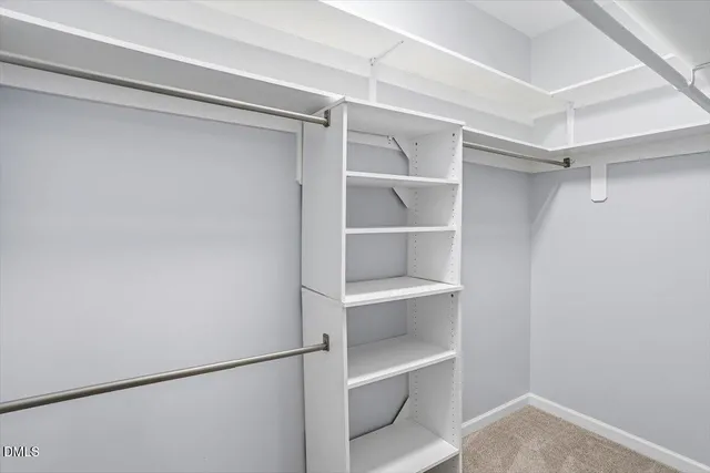 a view of an empty walk in closet