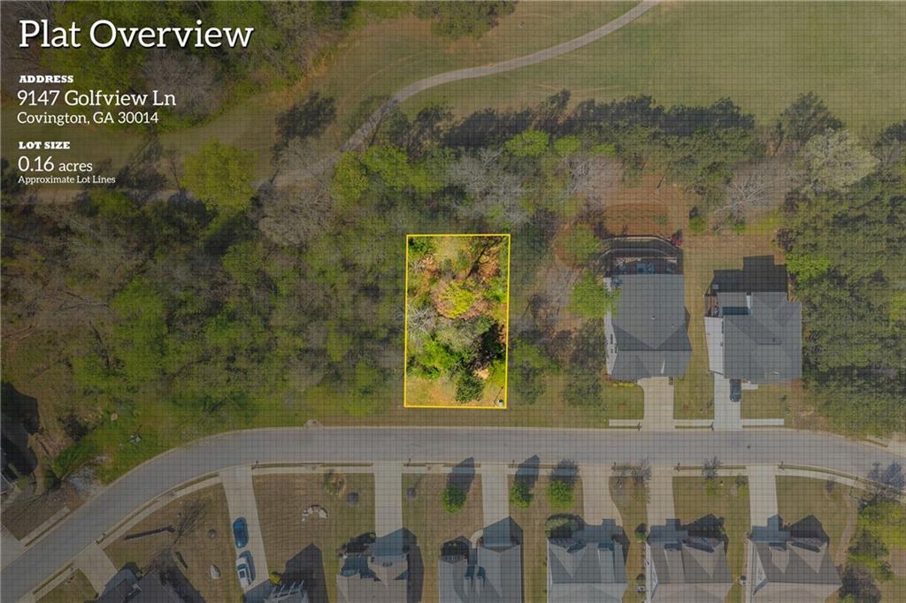 9147 Golfview Lane Covington, GA 30014 - Photo 1 of 19 a view of a brick wall with a building in the background