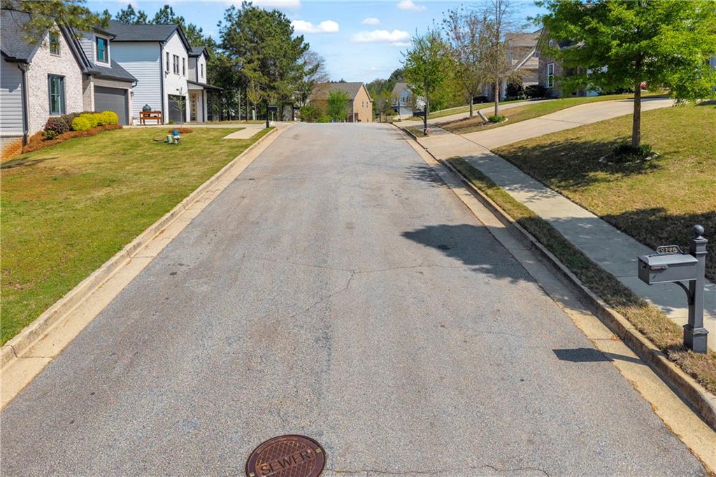 9147 Golfview Lane Covington, GA 30014 - Photo 13 of 19 a view of a street with houses
