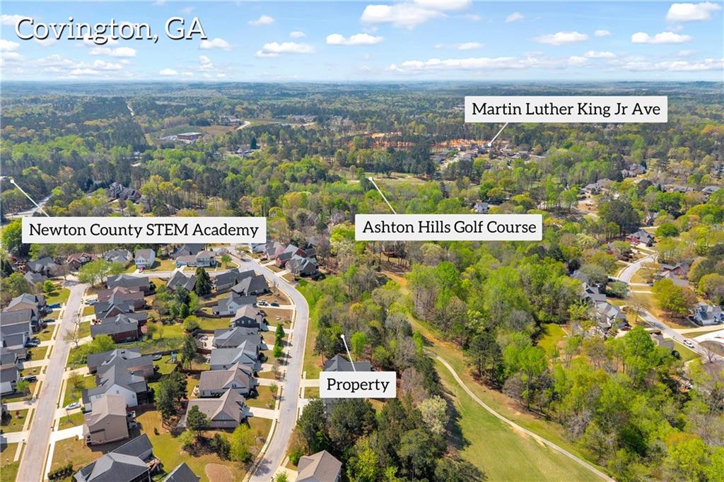 9147 Golfview Lane Covington, GA 30014 - Photo 6 of 19 a view of a sign board