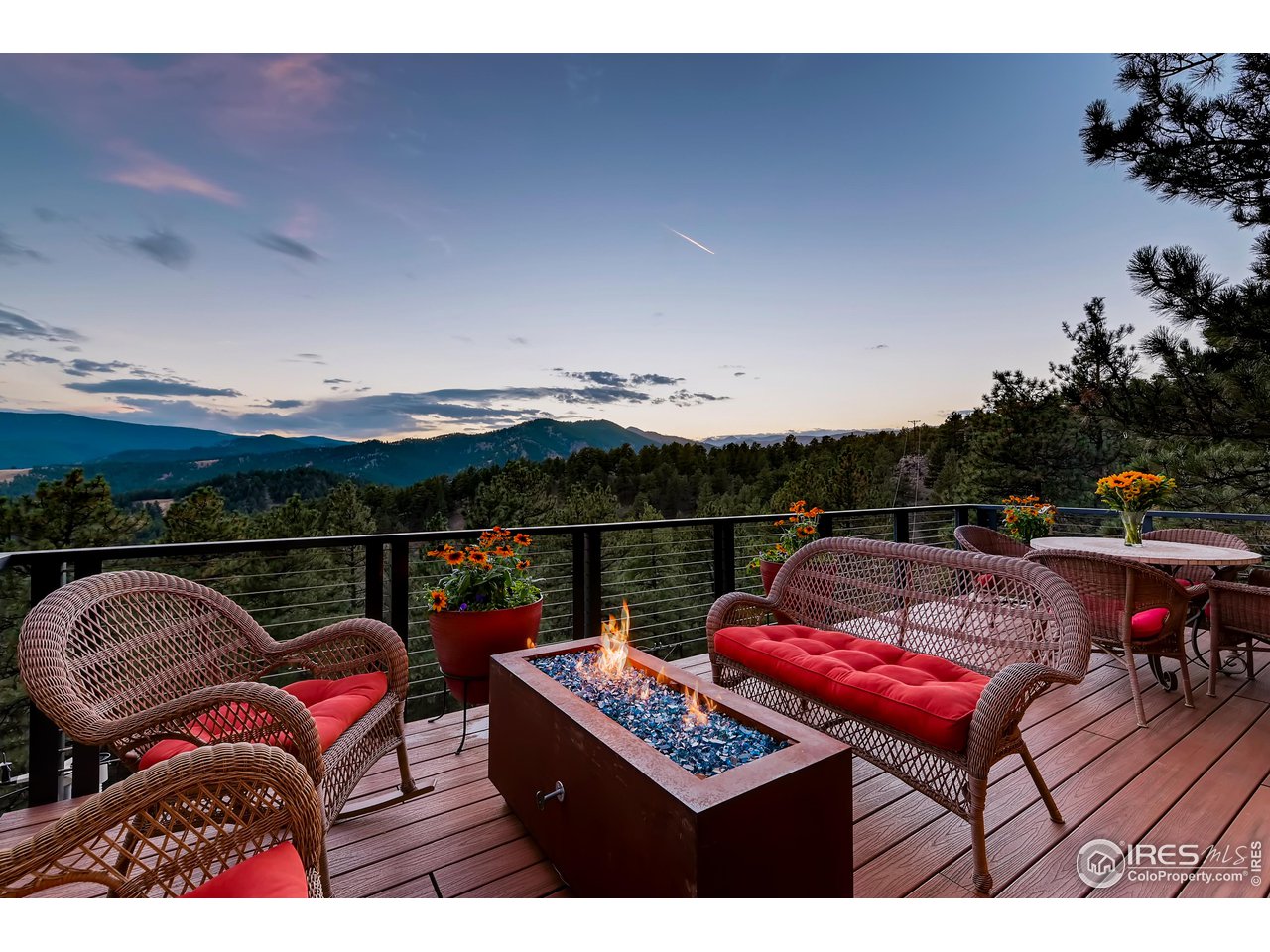 153 Poorman Road Boulder, CO 80302 - Photo 20 of 40 a view of a terrace with furniture