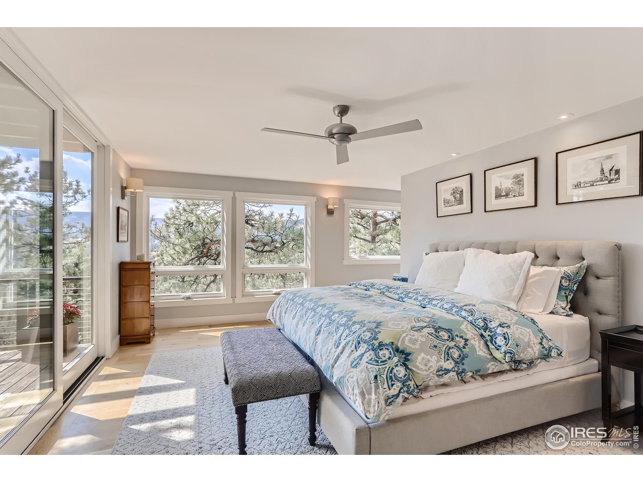 153 Poorman Road Boulder, CO 80302 - Photo 22 of 40 a bedroom with a large bed and a view of bedroom