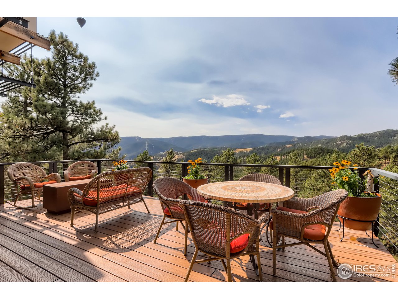 153 Poorman Road Boulder, CO 80302 - Photo 39 of 40 a view of a terrace with furniture and a potted plant
