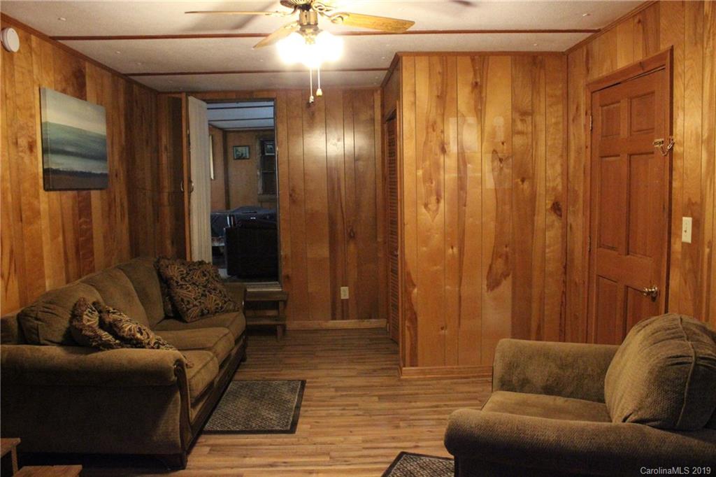 2856 Filbert Highway Clover, SC 29710 - Photo 3 of 11 a living room with furniture and a glass door shower