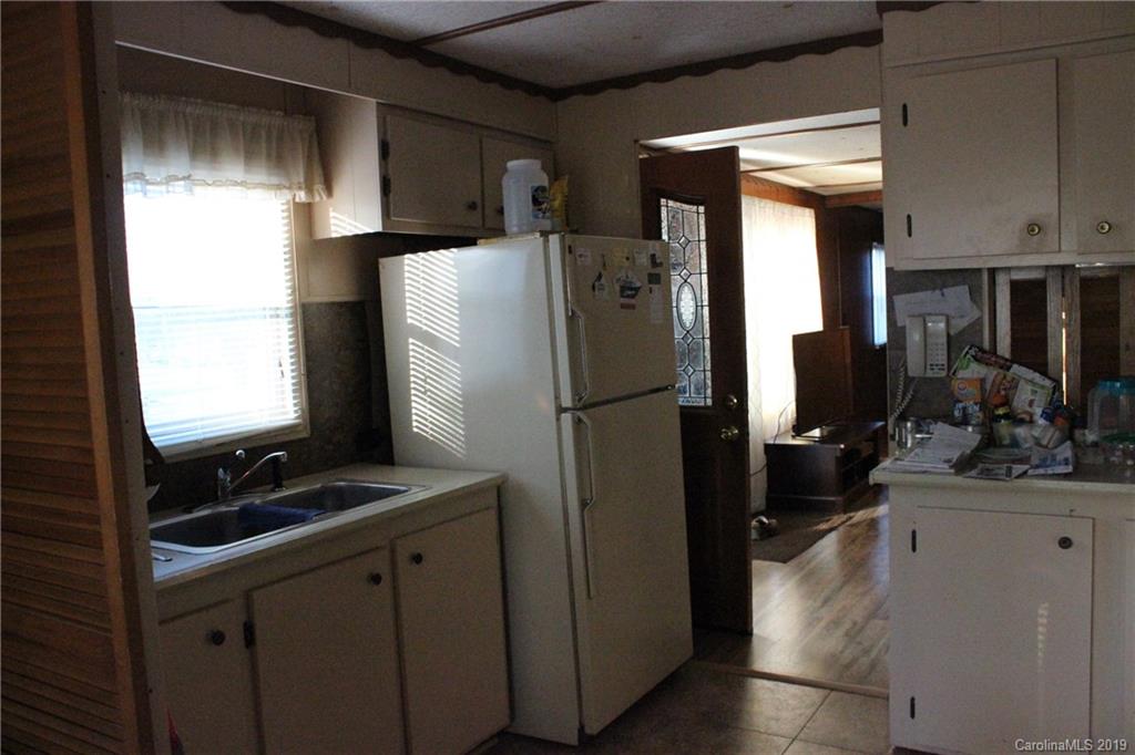 2856 Filbert Highway Clover, SC 29710 - Photo 4 of 11 a kitchen with a refrigerator and a sink