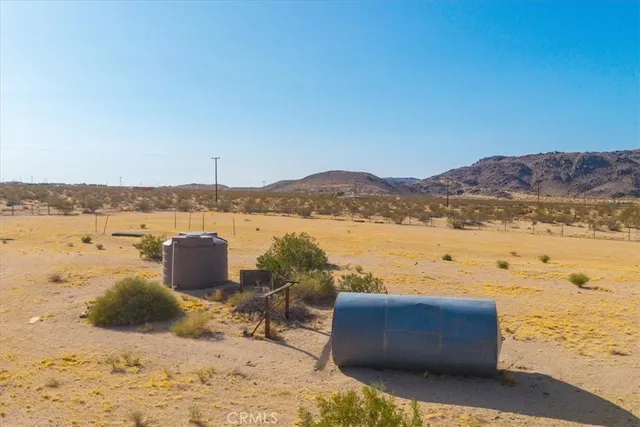 a front view of house with outdoor seating
