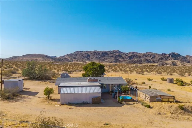 a view of a house with a ocean view