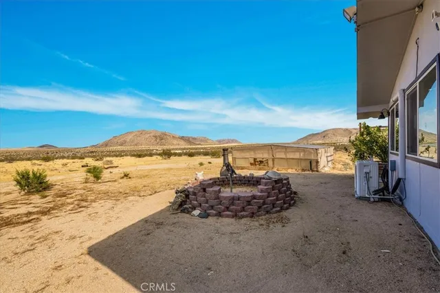 a view of an ocean and a mountain