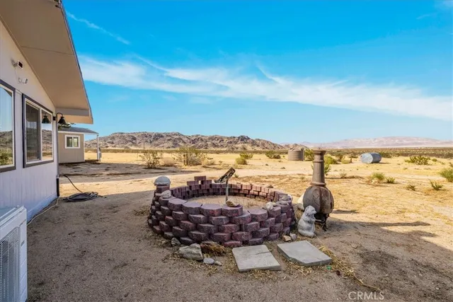 a view of an ocean and a mountain
