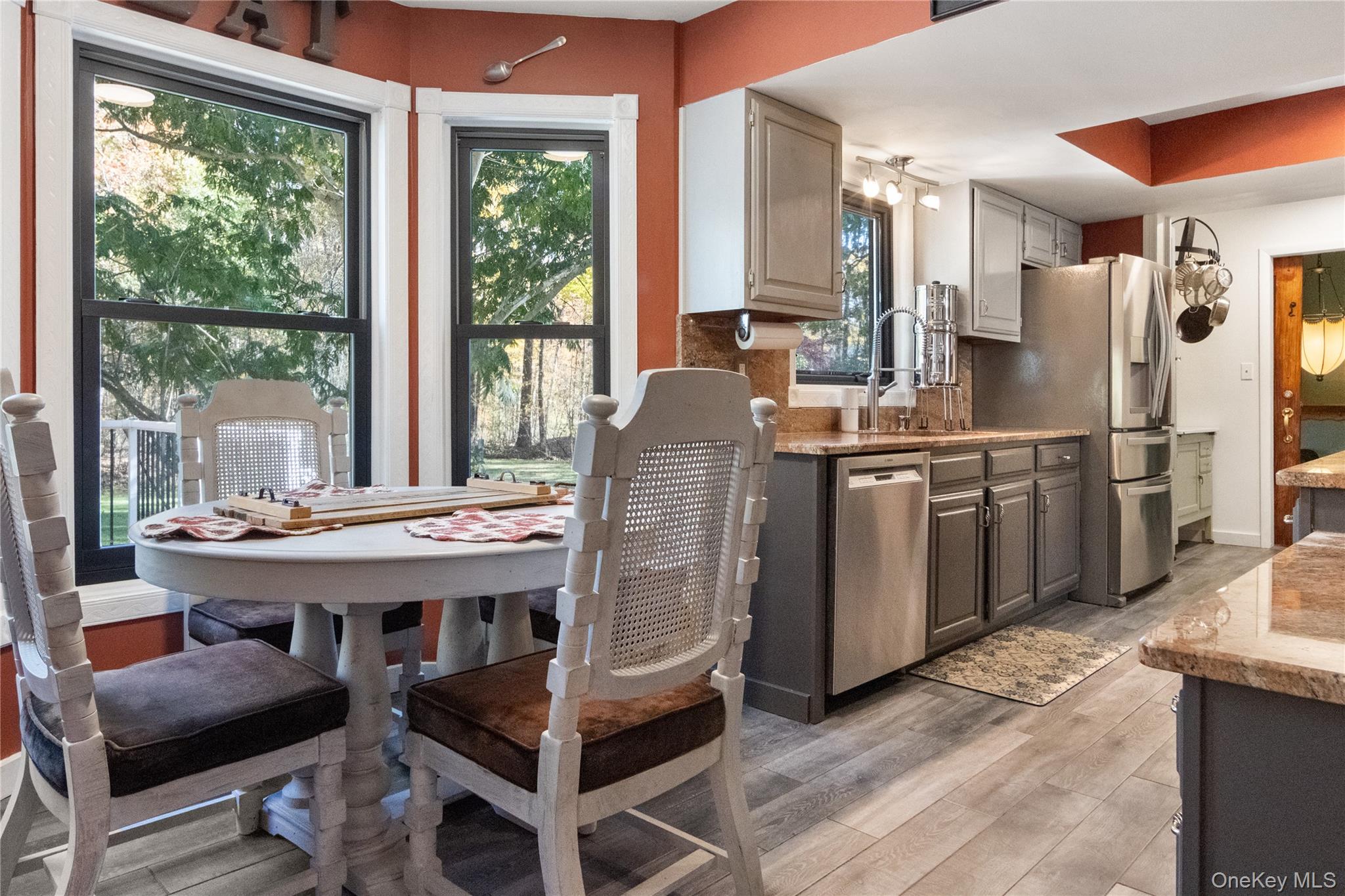12 Chapel Road Newburgh, NY 12550 - Photo 11 of 46 a view of a kitchen with a table and chairs