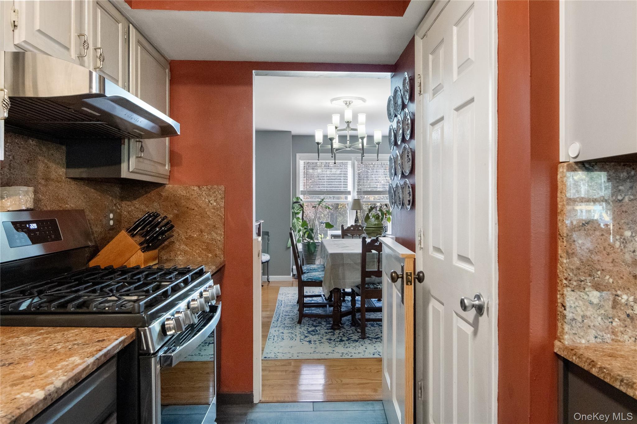 12 Chapel Road Newburgh, NY 12550 - Photo 15 of 46 a kitchen with stainless steel appliances granite countertop a stove and a refrigerator