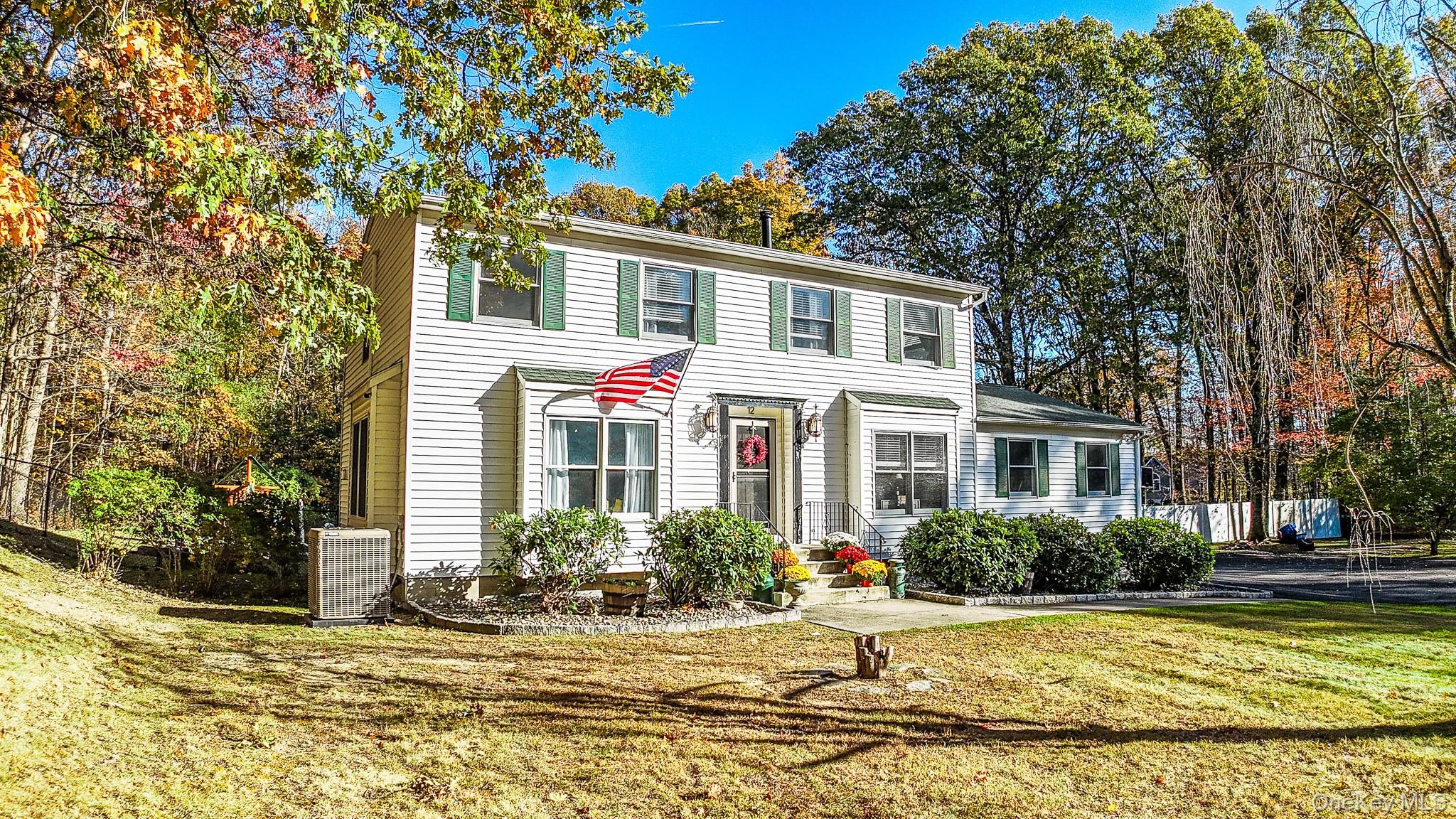 12 Chapel Road Newburgh, NY 12550 - Photo 2 of 46 a front view of a house with garden